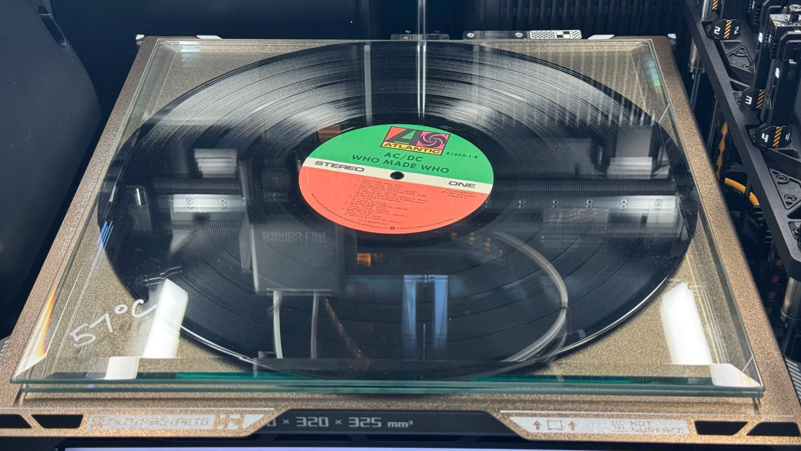 A record between two sheets of glass on the printer bed